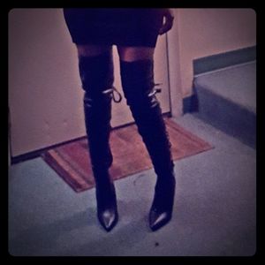 Black leather knee high boots